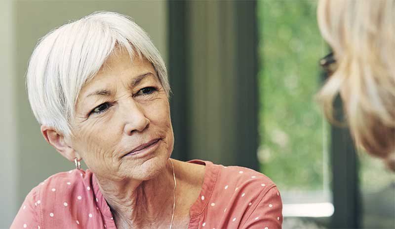 Woman with short white hair